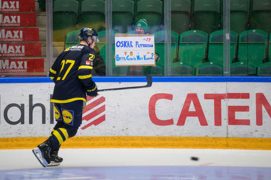Oskar Pettersson of Sweden is greeted by young supporters