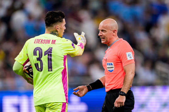 Referee Szymon Marciniak