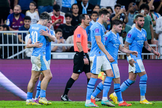Jack Grealish and Phil Foden of Manchester City celebrate