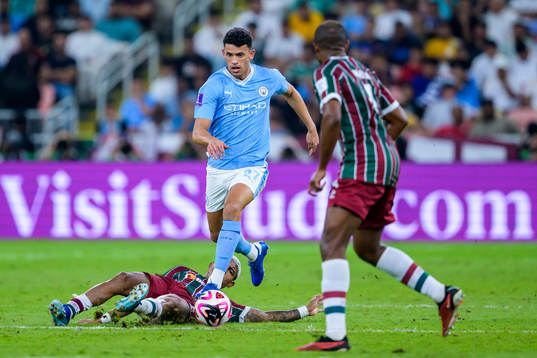 John Kennedy of Fluminense and Matheus Nunes of Manchester