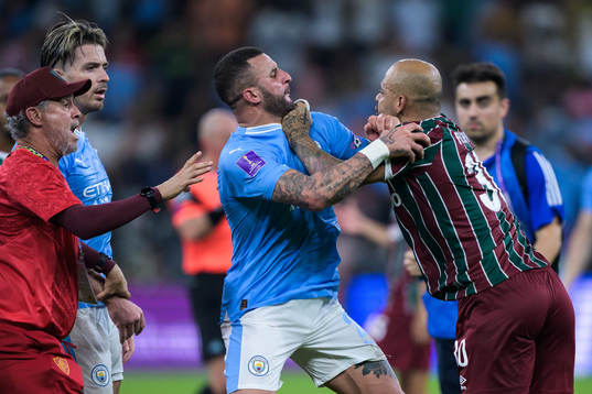 Kyle Walker of Manchester City  and Felipe Melo of