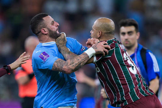 Kyle Walker of Manchester City  and Felipe Melo of