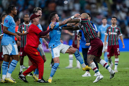 Kyle Walker of Manchester City  and Felipe Melo of