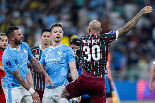 Kyle Walker of Manchester City  and Felipe Melo of