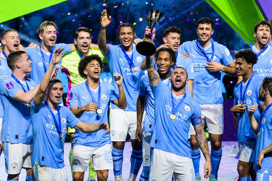 Kyle Walker of Manchester City celebrates with the trophy