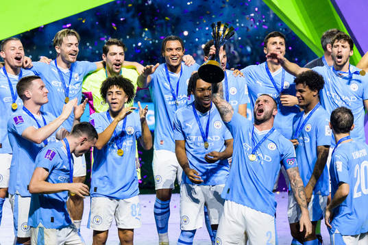Kyle Walker of Manchester City celebrates with the trophy