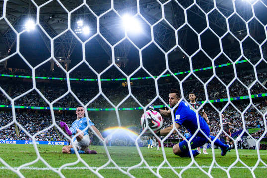 Phil Foden of Manchester City scores 0-3 behind goalkeeper