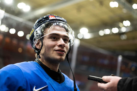 Isac Born of Sweden speaks with media