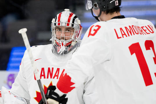 Goaltender Mathis Rousseau of Canada