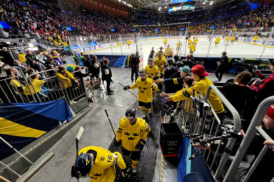 The Swedish team exit the ice