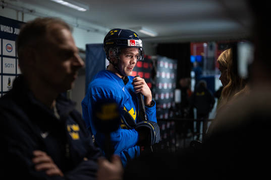 Theo Lindstein of Sweden speaks with media