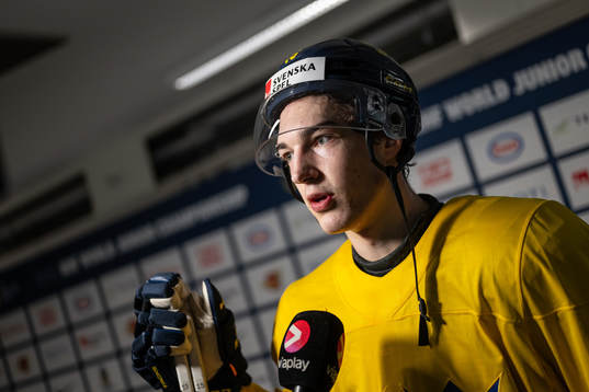 David Edstrom of Sweden speaks with media