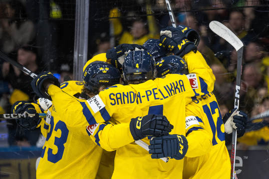 Players of Sweden celebrate with Anton Wahlberg