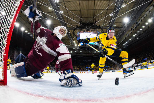 Filip Bystedt of Sweden scores the 4-0 goal behind Deivs