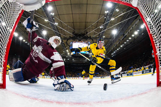 Filip Bystedt of Sweden scores the 4-0 goal behind Deivs