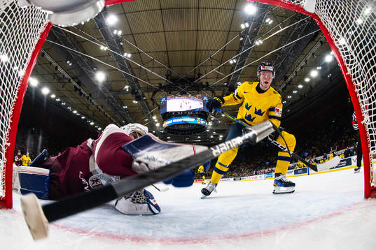 Filip Bystedt of Sweden scores the 4-0 goal behind Deivs