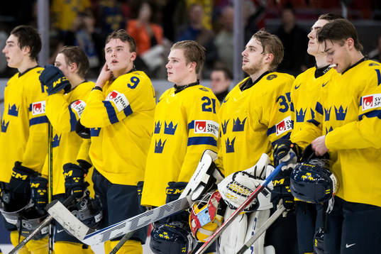 Goaltender Hugo Hävelid of Sweden celebrates
