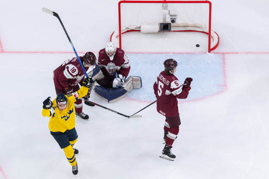 Felix Unger Sörum of Sweden scores the 5-0 goal behind