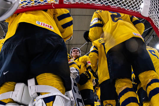 Theo Lindstein of Sweden celebrate with teammates