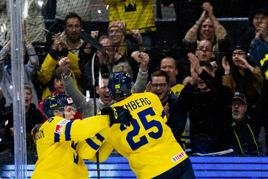 Elias Pettersson and Otto Stenberg of Sweden celebrate the