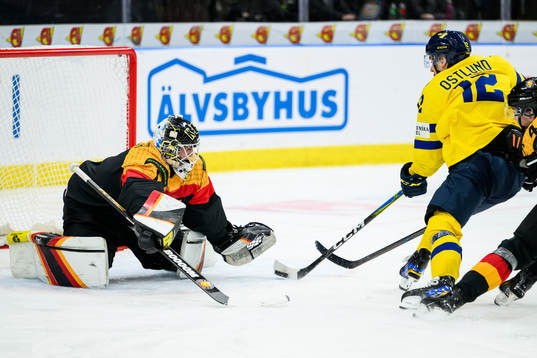 Goaltender Matthias Bittner of Germany and Noah Östlund of