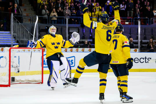 Goaltender Melker Thelin and Anton Johansson of Sweden