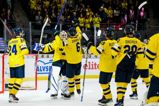 Goaltender Melker Thelin and Anton Johansson of Sweden