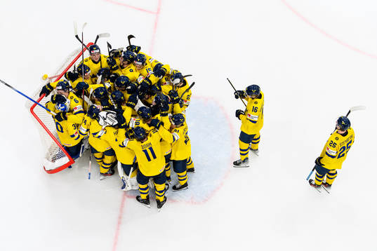 Players of Sweden celebrate