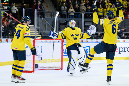 goaltender Melker Thelin and Anton Johansson of Sweden