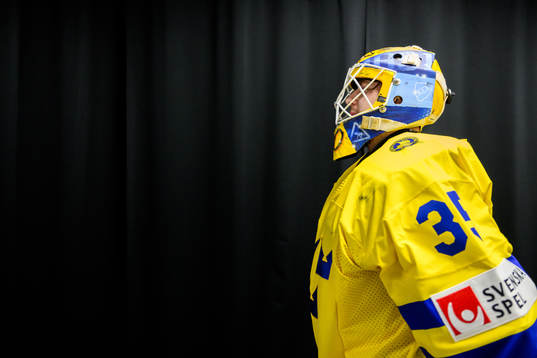 Goaltender Hugo Hävelid of Sweden celebrating
