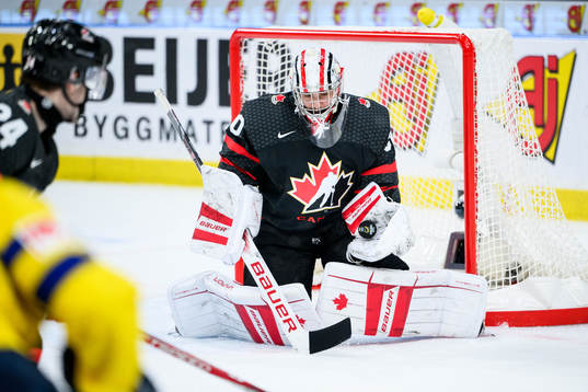 Goaltender Mathis Rousseau of Canada