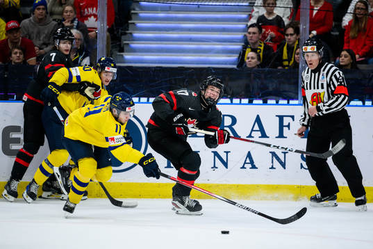Isac Born of Sweden and Macklin Celebrini of Canada