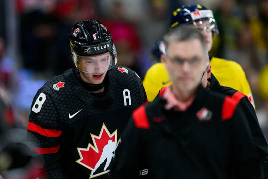Owen Beck of Canada leaves the ice