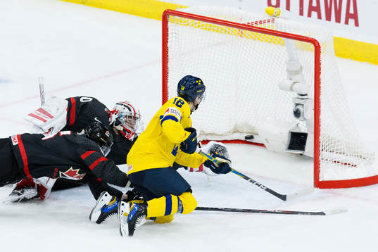 Noah Östlund of Sweden scores the 0-2 goal behind