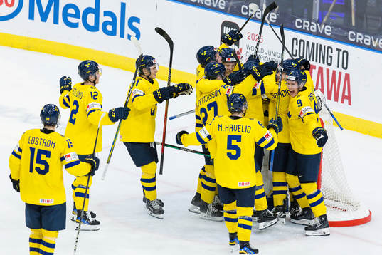 Players of Sweden celebrate