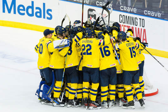 Players of Sweden celebrate