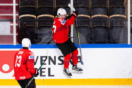 Simon Meier of Switzerland celebrates scoring 1-0