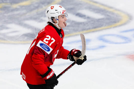 Simon Meier of Switzerland celebrates scoring 1-0