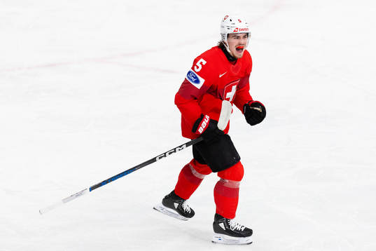 Leo Braillard of Switzerland celebrates scoring 2-2