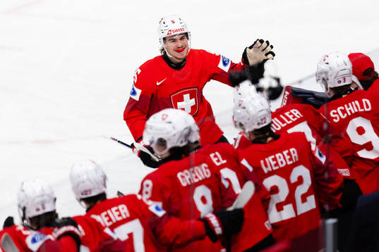 Leo Braillard of Switzerland celebrates scoring 2-2