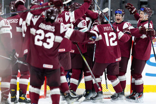 Players of Latvia celebrate