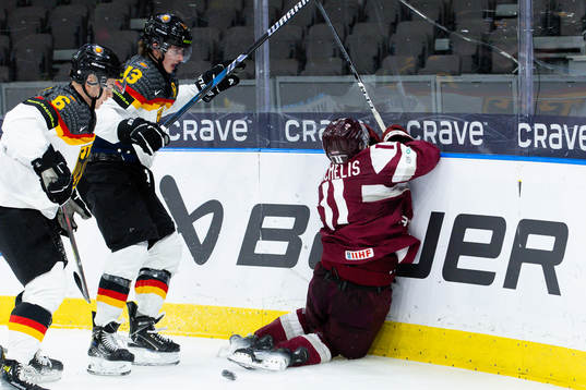 Veit Oswald of Germany hits Dans Locmelis of Latvia