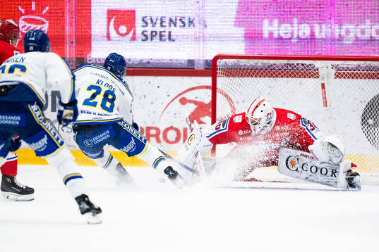 Leksands Justin Glenn Kloos och Timrås målvakt Jacob