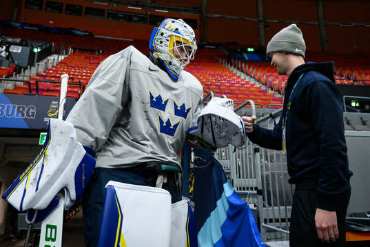 goaltender Melker Thelin and Equipment manager Jonas