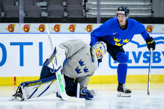 goaltender Melker Thelin and Anton Johansson of Sweden at a