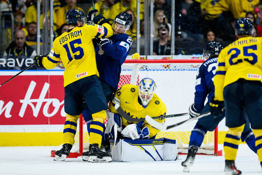 David Edstrom and goaltender Melker Thelin of Sweden and