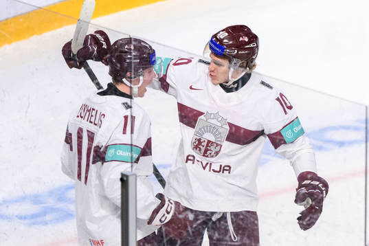 Dans Locmelis and Emils Veckaktins of Latvia celebrates