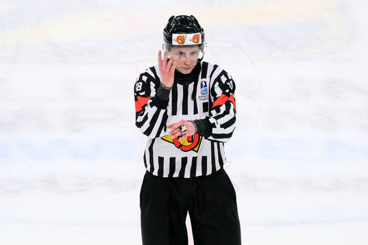 Referee signs for slashing