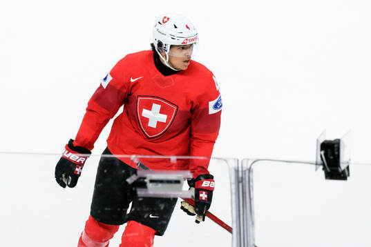 Rodwin Dionicio of Switzerland looks dejected
