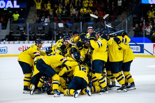Axel Sandin-Pellikka of Sweden celebrates with team mates